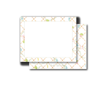 A set of rectangular notepads with a white center writing area and a delicate border featuring a light beige trellis pattern accented with pastel blue, green, and pink floral details. One notepad is shown flat, and another is slightly offset behind it to display the patterned cover.