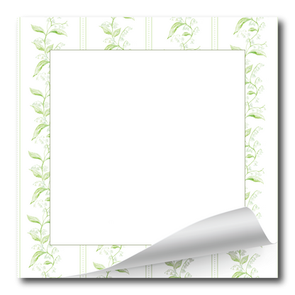 A square white paper notepad or stationery sheet with a decorative border of light green leafy vines around the edges and a curled bottom-right corner, shown on a white background.